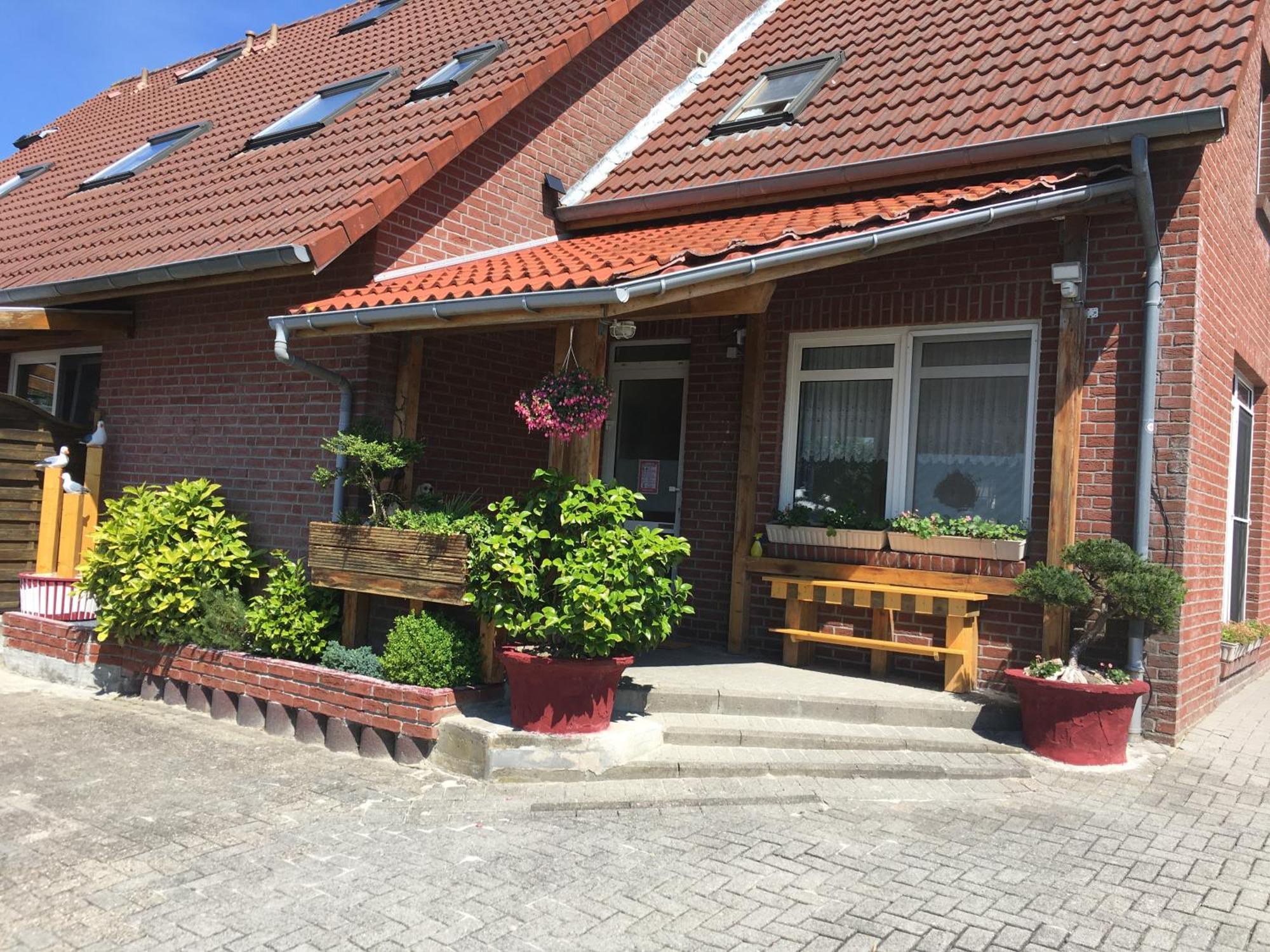 Garni Hotel-Pension Holum Neuharlingersiel Exterior foto